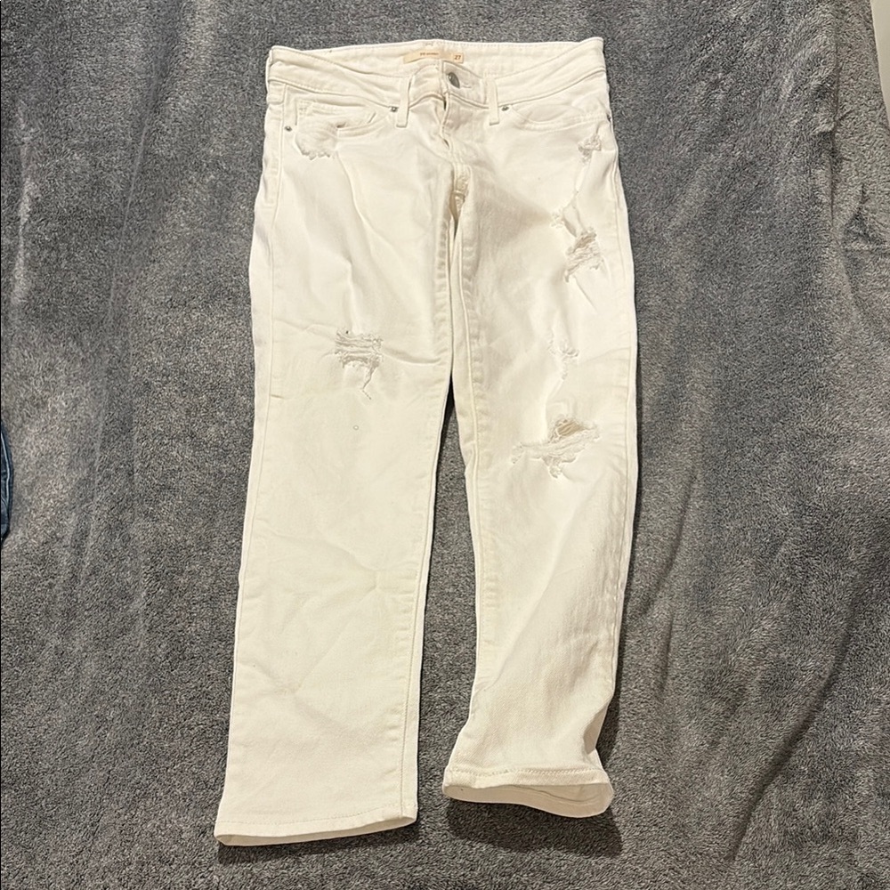 Levi's Cream Distressed Ankle Jeans